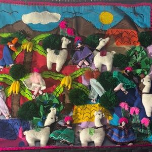 Peruvian Arpillera. Handmade, three-dimensional patchwork textile mural.